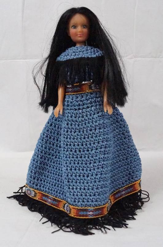 lot 6214 image: Beautiful Native American Doll w Crotchet Dress- High Quality w Stand