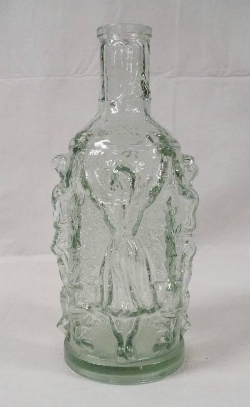 lot 6257 image: Glass Bottle w Boy and Girl Figures Molded into Glass- Neat