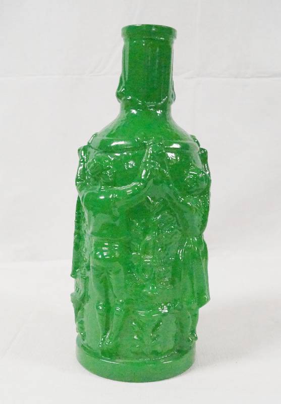 lot 6258 image: Beautiful Green Colored Bottle w Figures Molded into Glass- Made in Spain
