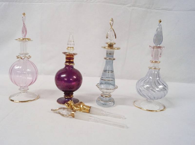 lot 6322 image: Lot of 4 - Egyptian Perfume Bottles w 2 extra lids - Nice Very Pretty