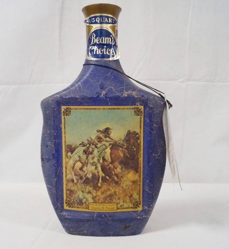 lot 6325 image: Beams Choice Decanter - Jim Beam - Featuring Native American Painting THE BUFFALO HUNT by Charles M. Russell w original hang tag