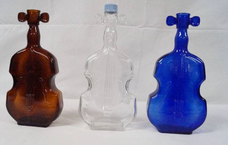 lot 6338 image: 3 Vintage Glass Violin Bottle Vases Blue Amber & Clear