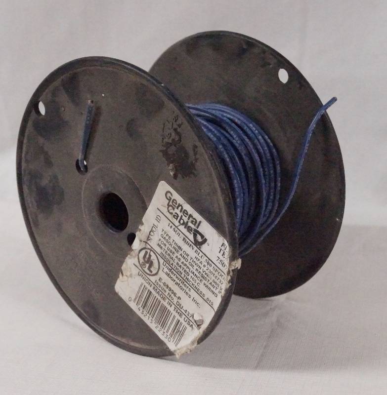 lot 4292 image: Partial Spool of Blue Coated Wire - see pics for info