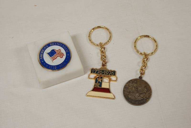 lot 4476 image: Lot of 2 Patriotic Key Chains and a Patriotic Marble Paper Weight