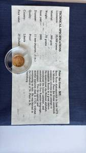 lot 503 image: Worlds smallest gold coin Peter the Great Gold Coin with Documentation