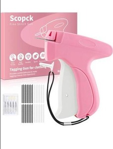lot 75357 image: Stitchy Gun for Clothes - Handheld Stitch Gun Quick Clothing Fixer - Tagging Gun - Includes 6 Needle, 1000 Black Fasteners & 1000 White Fasteners (Pink