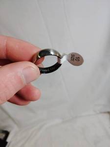 lot 11 image: Size 10 Ring says I LOVE YOU on the inside