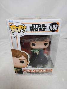 lot 348 image: Luke Skywalker with Grogu Funko Pop