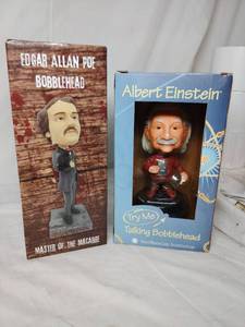 lot 92 image: Albert Einstein and Edgar Allen Poe Bobbleheads