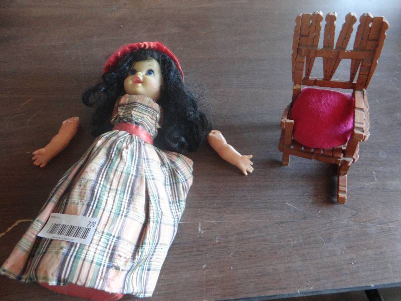 lot 770 image: Damaged doll wdamaged chair.