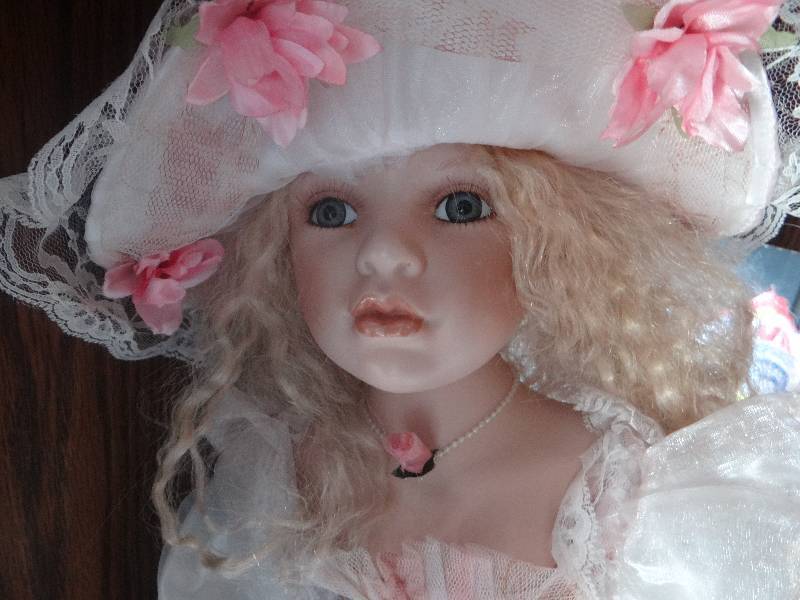lot 782 image: Duck house heirloom porcelain doll larger in box.