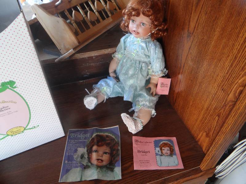 lot 783 image: Paradise galleries Bridgel porcelain doll in box.