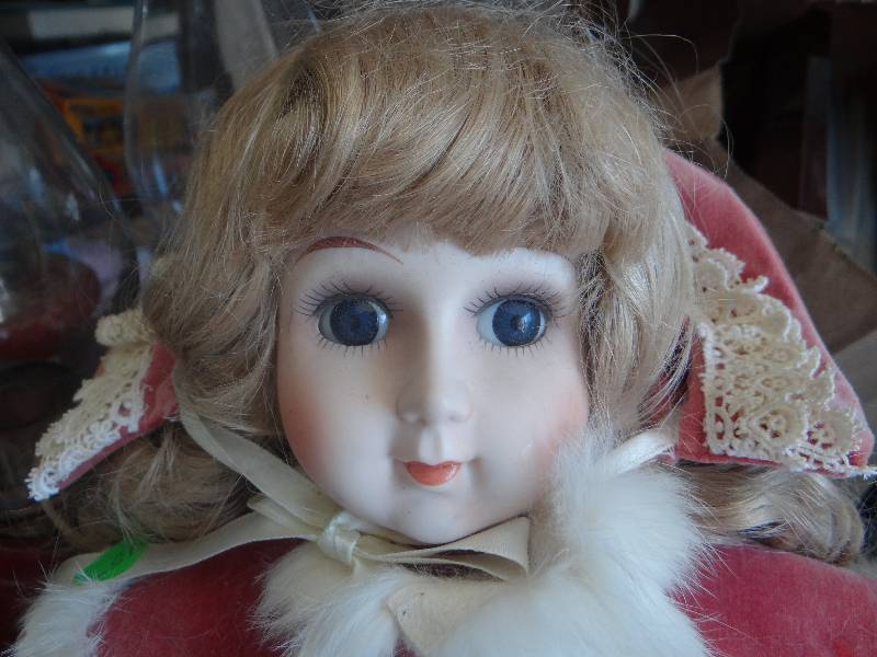 lot 812 image: Antique ceramic doll.