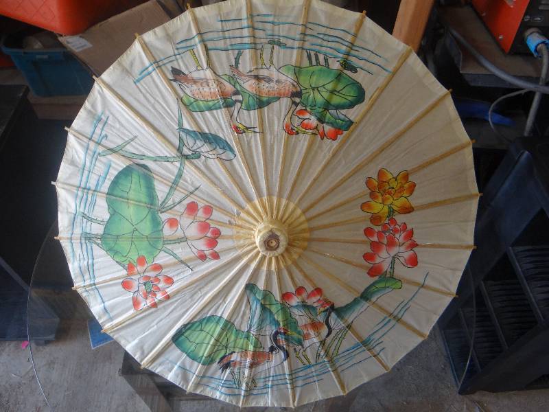 lot 817 image: Hand made decrotive paper umbrella.
