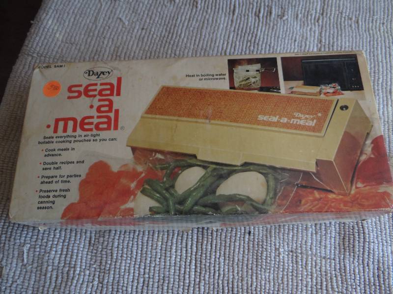 lot 827 image: Seal a meal in box.
