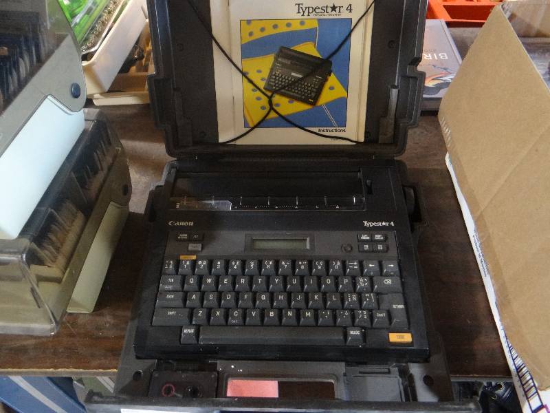lot 840 image: Portable typewrighter, cd disk, DVDs, old comp software.