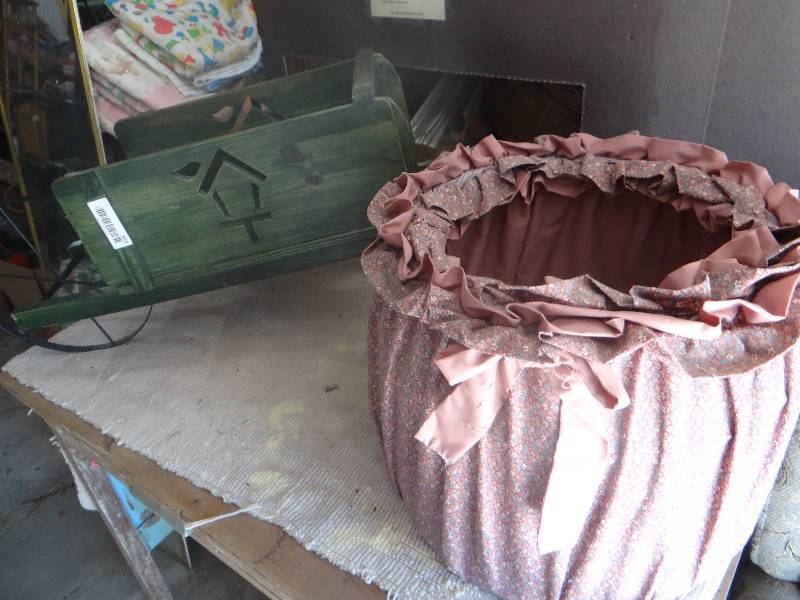 lot 853 image: Decorative home decor wood wagon and cloth basket.