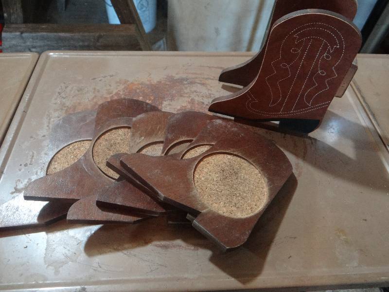 lot 880 image: Cowboy boot casters with holder.