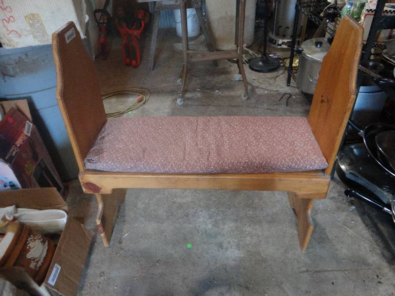 lot 881 image: small wood bench with padded seat.