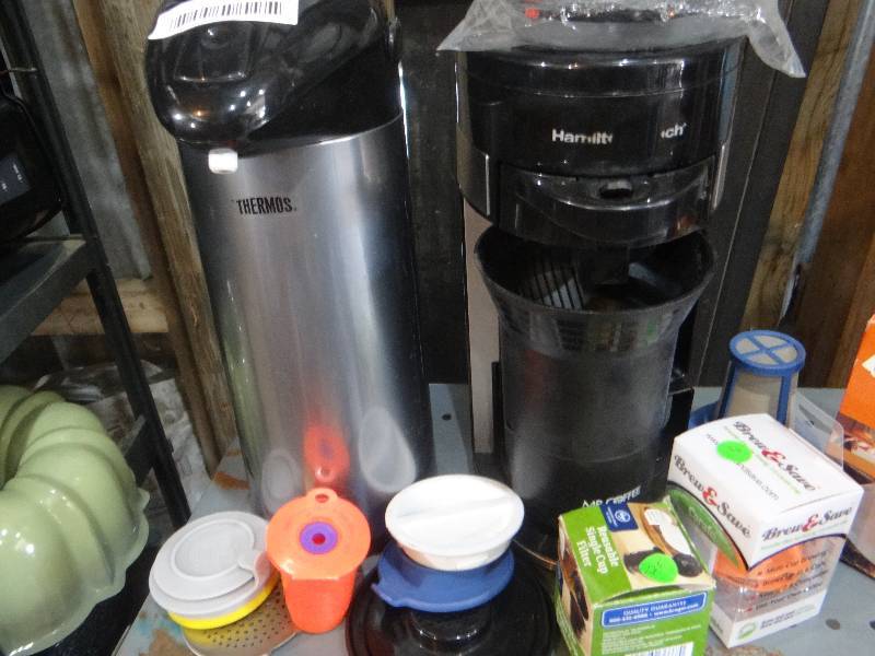 lot 904 image: Tin, coffee maker and filters.
