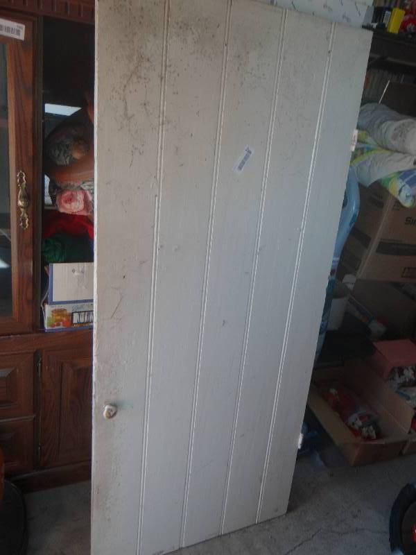 lot 916 image: Rustic wooden barn style door 26x57.