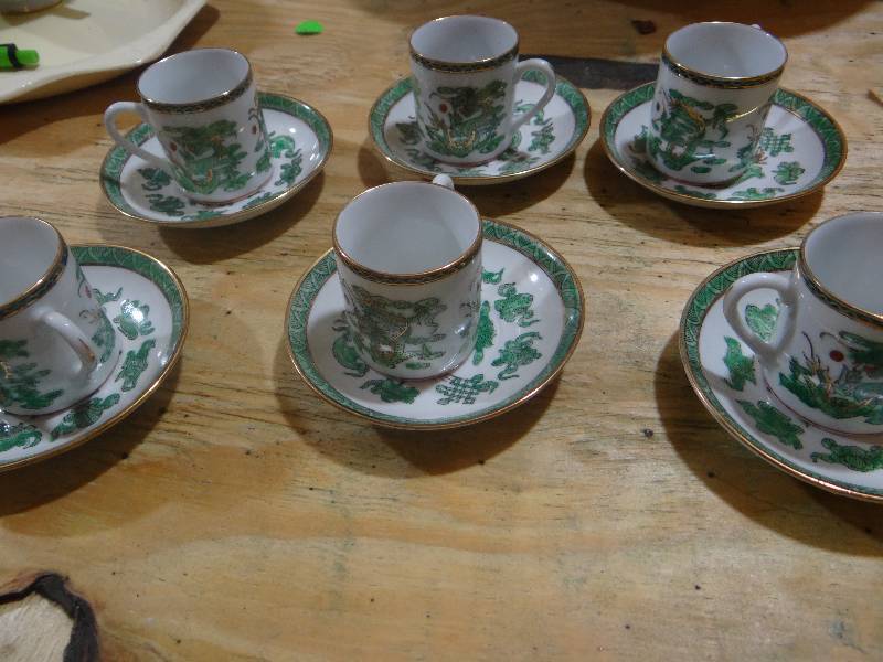 lot 921 image: China hand painted tea cup and saucer set.