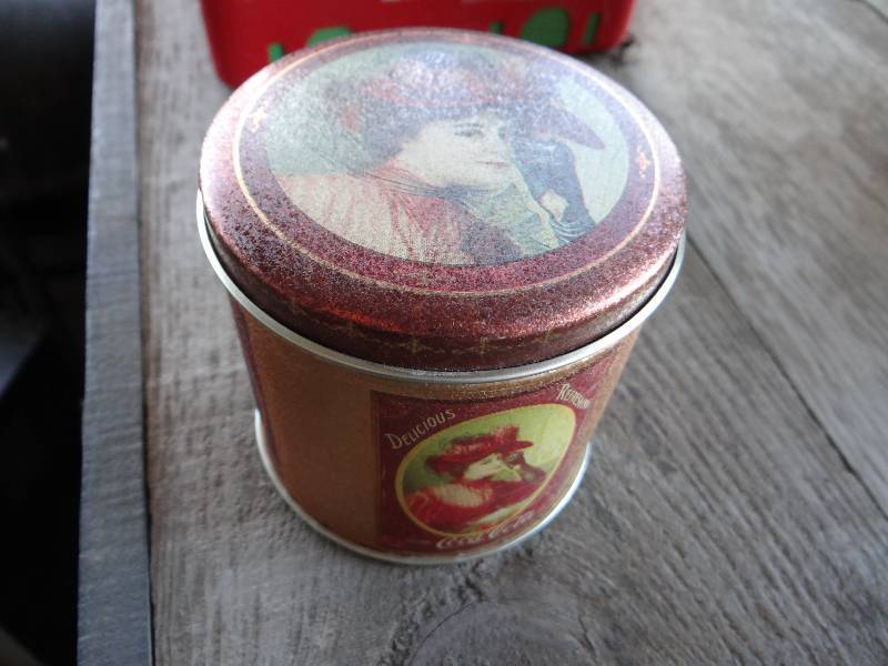 lot 959 image: Coca Cola tin collectibles.