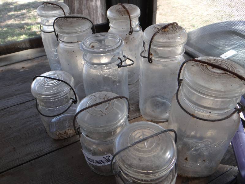 lot 979 image: Lot of old mason jars.
