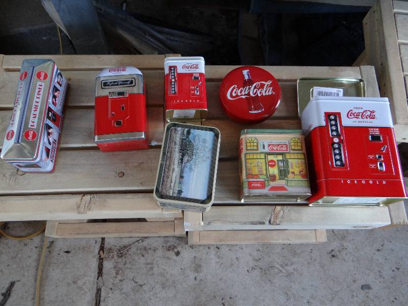 lot 991 image: 6 Coca Cola tins.