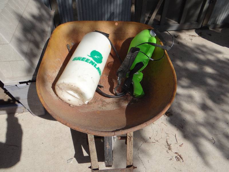 lot 1003 image: Wheelbarrow and 2 hand sprayers.