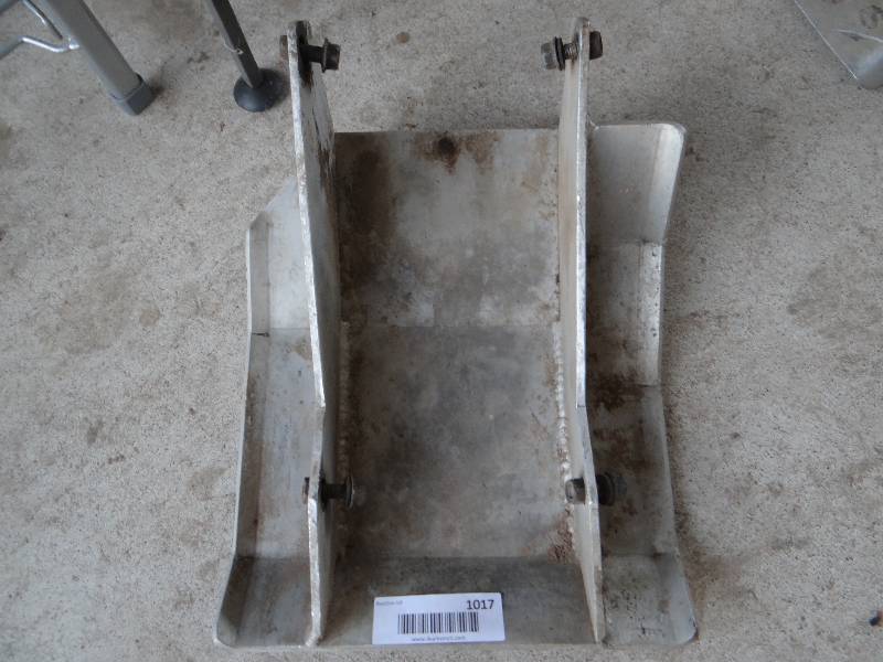 lot 1017 image: Aluminum ATV sprocket and chain guard.