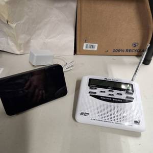 lot 268 image: Amazon Echo and Midland weather radio (no power cord)