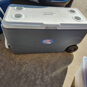 lot 311 image: Coleman Extreme 5 day cooler with back wheels
