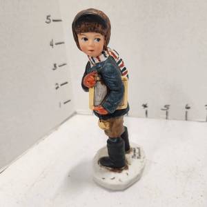 lot 403 image: Norman Rockwell figurine The Saturday Evening Post