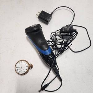 lot 417 image: Elgin pocket watch and Norelco electric razor