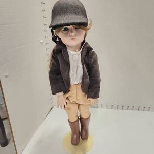lot 451 image: Simon Halbig 117A porcelain doll with stand 19 tall