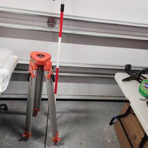lot 456 image: Huntoons Inc adjustable tripod with telescoping pole both used for surveying