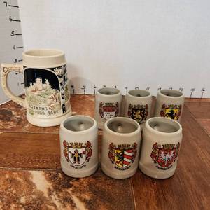 lot 604 image: Vintage German mug with 6 vintage mini German stoneware mug shot glasses