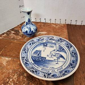 lot 606 image: Delft porcelain wall hanging and small vase (repaired) both hand painted