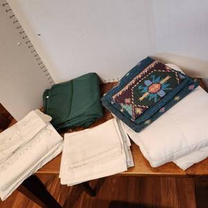 lot 609 image: Twin sheet set & mattress pad and queen sheets and misc pillowcases