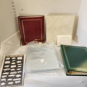 lot 621 image: Photo albums, plastic photo sleeves and photo caption stickers