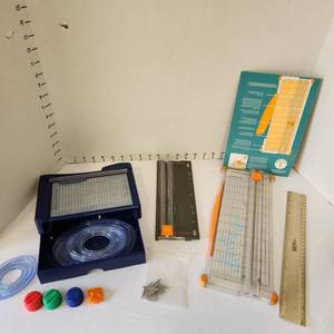 lot 627 image: Creative Memories paper cutter with attachments and 2 Fiskars paper cutters