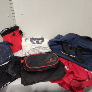 lot 648 image: Wrangler duffel bag, assorted bags and 3 Mixture No 79 Pipe Power tshirts (2 unopened)
