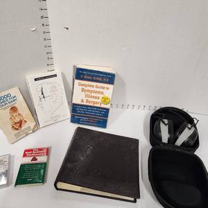 lot 660 image: 3M Work Tunes Connect AMFM hearing protection headphones, photo album and assorted books