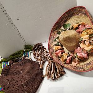 lot 682 image: Sombrero with lei, macrame hanger and 2 crocket bags