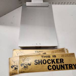 lot 686 image: Metal clipboard with two compartment and Shocker Country bumper stickers