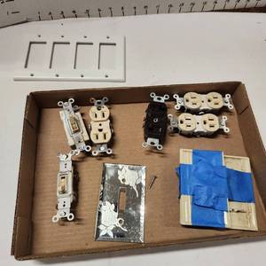 lot 709 image: Light switches and plates