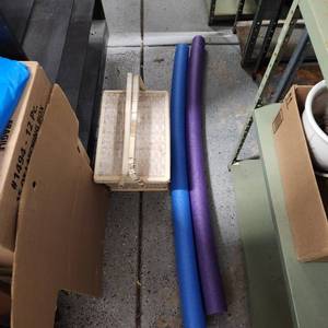 lot 711 image: Pool noodles and picnic basket