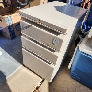 lot 720 image: Metal rolling file cabinet with key 27 x 15 x 23