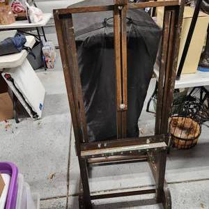 lot 617 image: Wood art easel 50 x 23 wide with 2 removable shelves 18 x 12 each (base folds up)